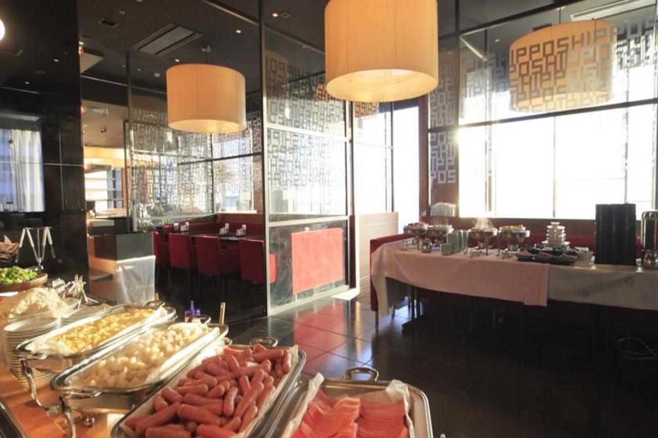 Отель Sotetsu Grand Fresa Shinagawa Seaside Токио Ресторан фото